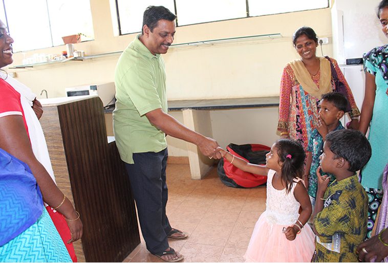 Child thanking Mr. Anish of the facilities crew