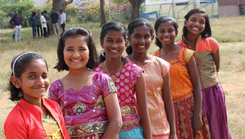 Students smiling in formal dresses - 2021 year in review