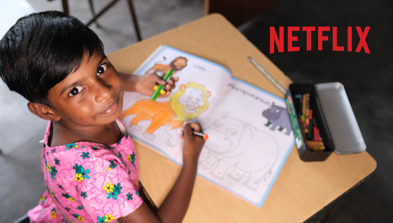 Little girl studying at desk