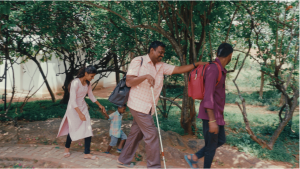 Paul and his father on his first day at Shanti Bhavan